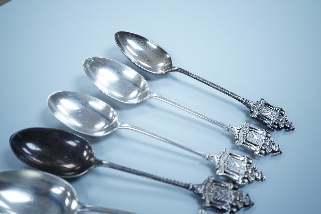 A matched set of seven early 20th century silver spoons, with rat-tail bowls, the terminals modelled as the crest of the Worshipful Company of Joiners and Ceilers, various dates and makers including Mappin & Webb and Elk